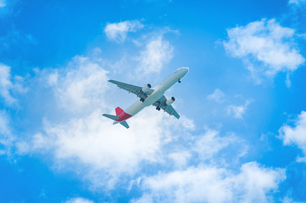 Plane flying in the blue sky containing airplane, plane, and sky, a Transportation Photo by Vapi