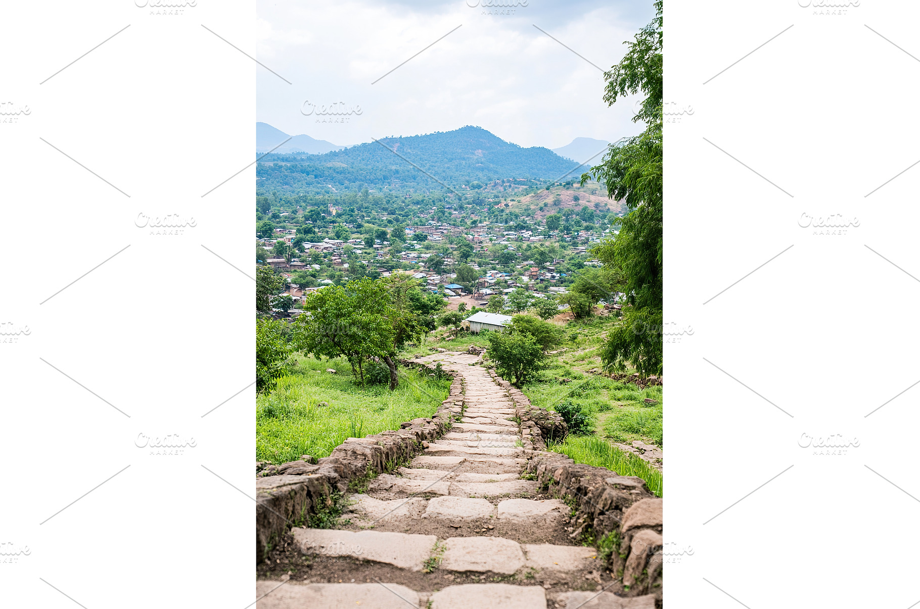 Mountain view path to scenic village, a Nature Photo by Lermont51