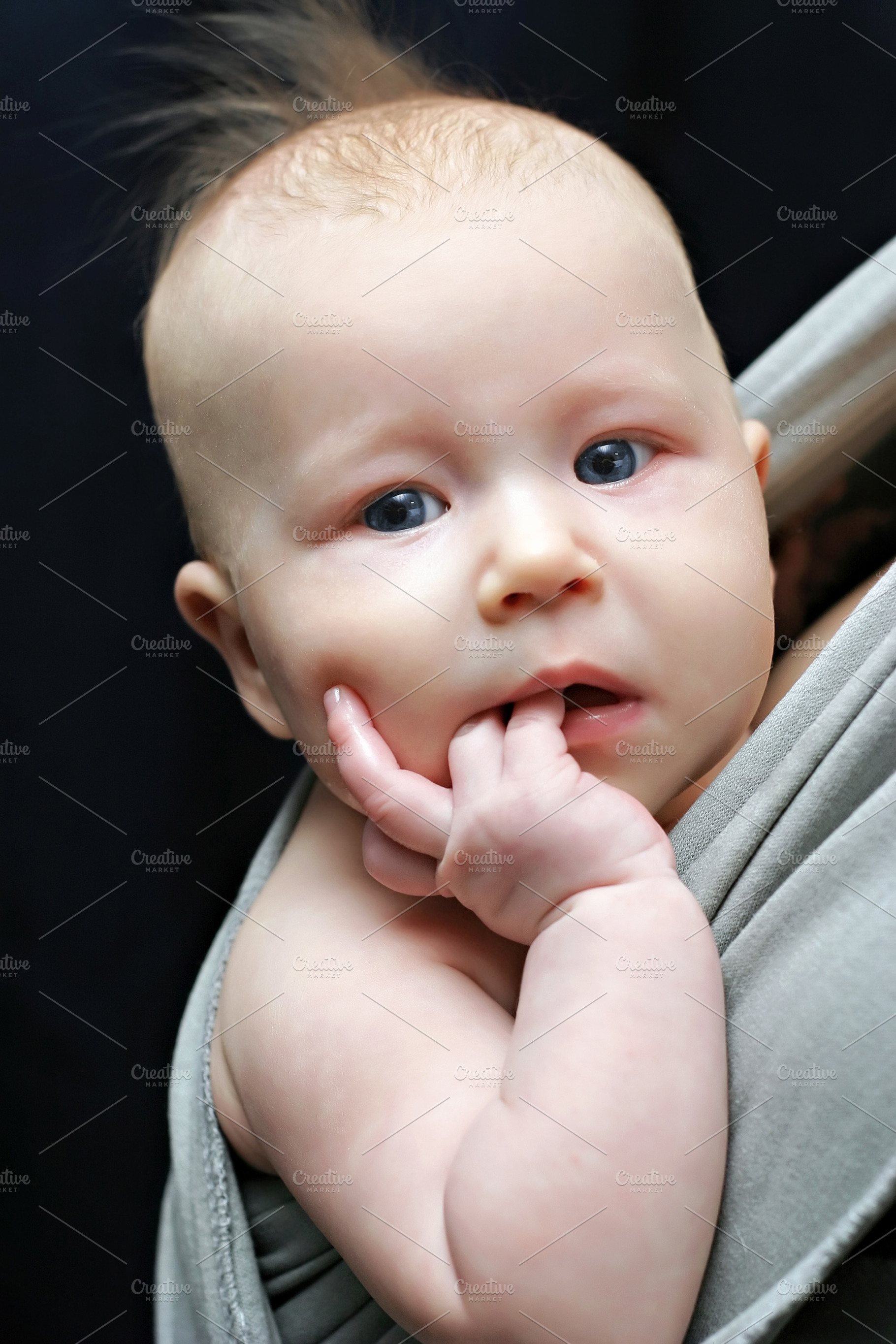 Newborn baby in the sling, a Photo by saiko3p