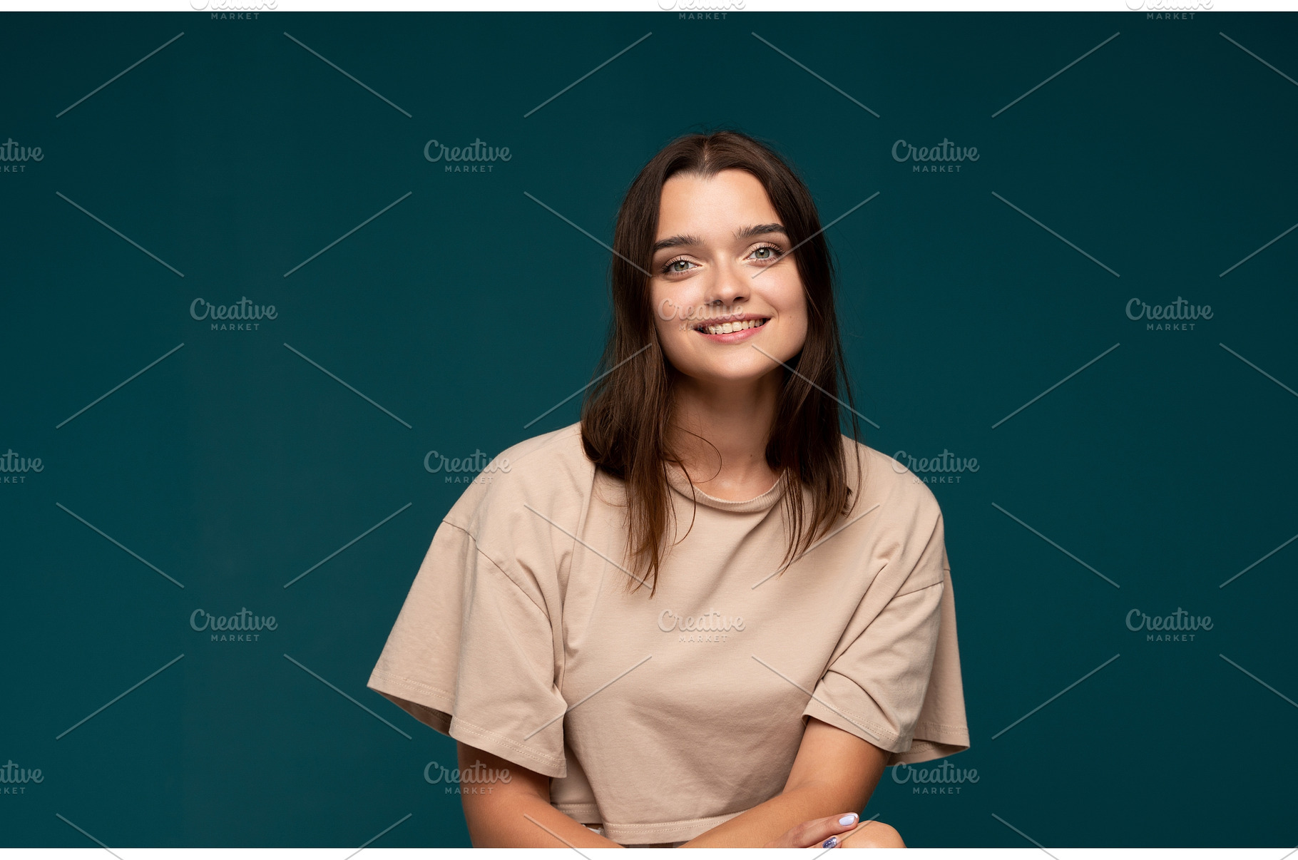 Young woman confidently smiling, a Person Photo by volodymyrshtun13795
