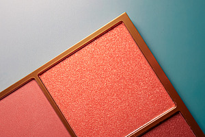 Makeup palette featuring shimmering coral and matte pink eyeshad, a Photo by Studio ANNA