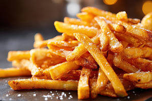 Crispy french fries with salt, a Food & Drink Photo by AlyaAnd
