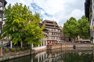 Historic canal houses in Strasbourg France reflections view, an Architecture Photo by GoodGoods