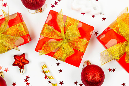 Red and gold christmas baubles, red gift boxes at white backgrou, a Holiday Photo by vimart