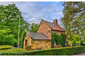 Captain cook's cottage in fitzroy garden melbourne australia featuring, an Architecture Photo by Leonid Andronov