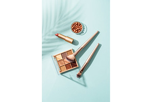 Make up products on blue background., a Beauty & Fashion Photo by Nadia-nb