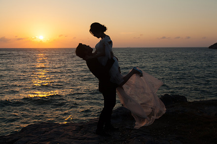 Silhouettes of man lifting girl stock photo containing couple and man, a Person Photo by a454