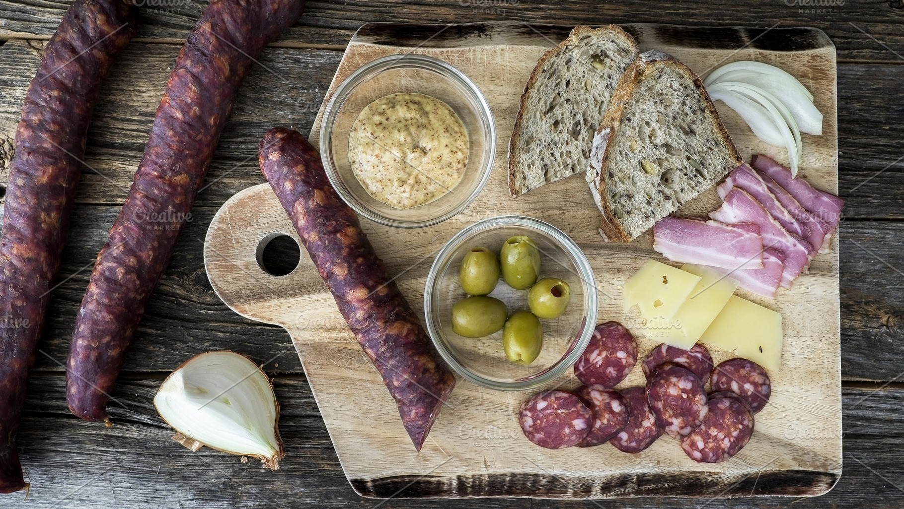 Sausages, cheese, and bread on a woo, a Food & Drink Photo by 1miromiro