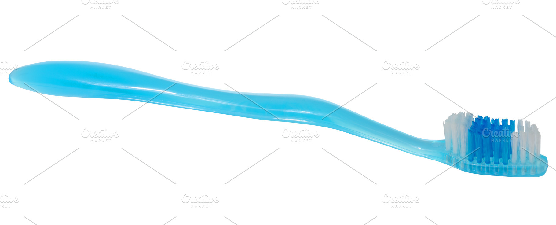 Blue toothbrush with white and blue bristles. Oral hygiene item, a Health & Medical Photo by ndanko