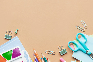 School supplies and art tools creating colorful education concep, a School & Education Photo by Olena Rudo