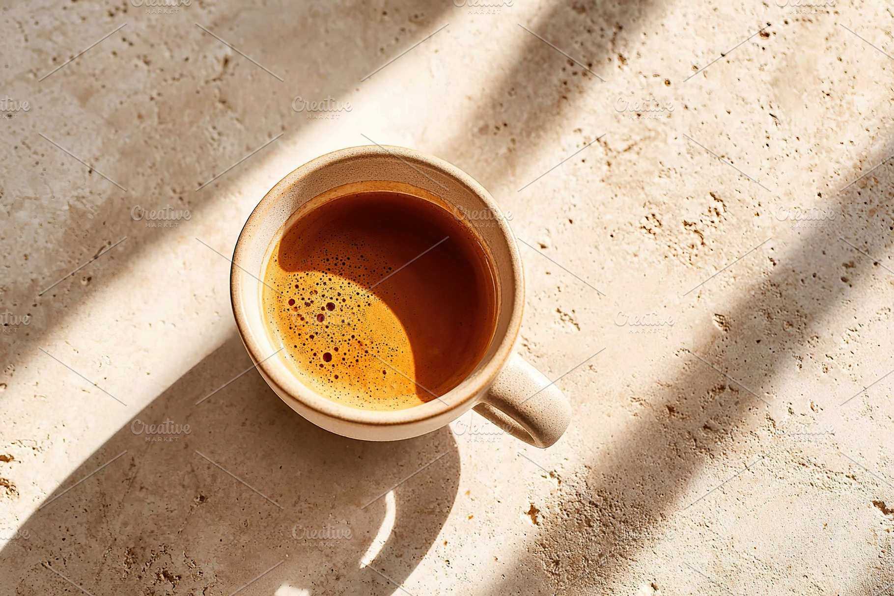Warm ceramic cup filled with rich coffee resting on a textured surface in brigh, a Food & Drink Photo by AlyaAnd