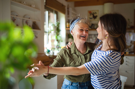 Happy senior mother having fun with, a Person Photo by HalfPoint