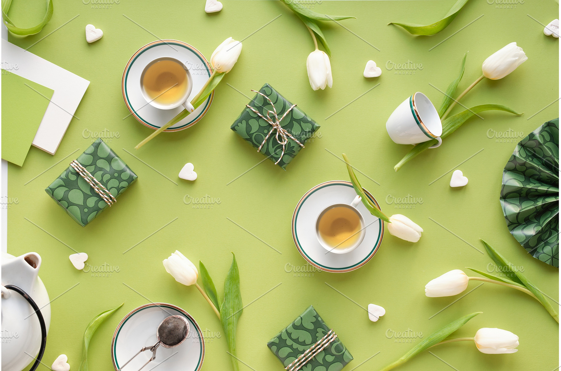 Easter flatlay with green gift boxes, a Background Photo by tilialucida