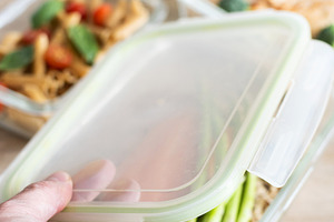 Closing Healthy Meal Prep Container with Salmon and Vegetables, a Food & Drink Photo by etorres69
