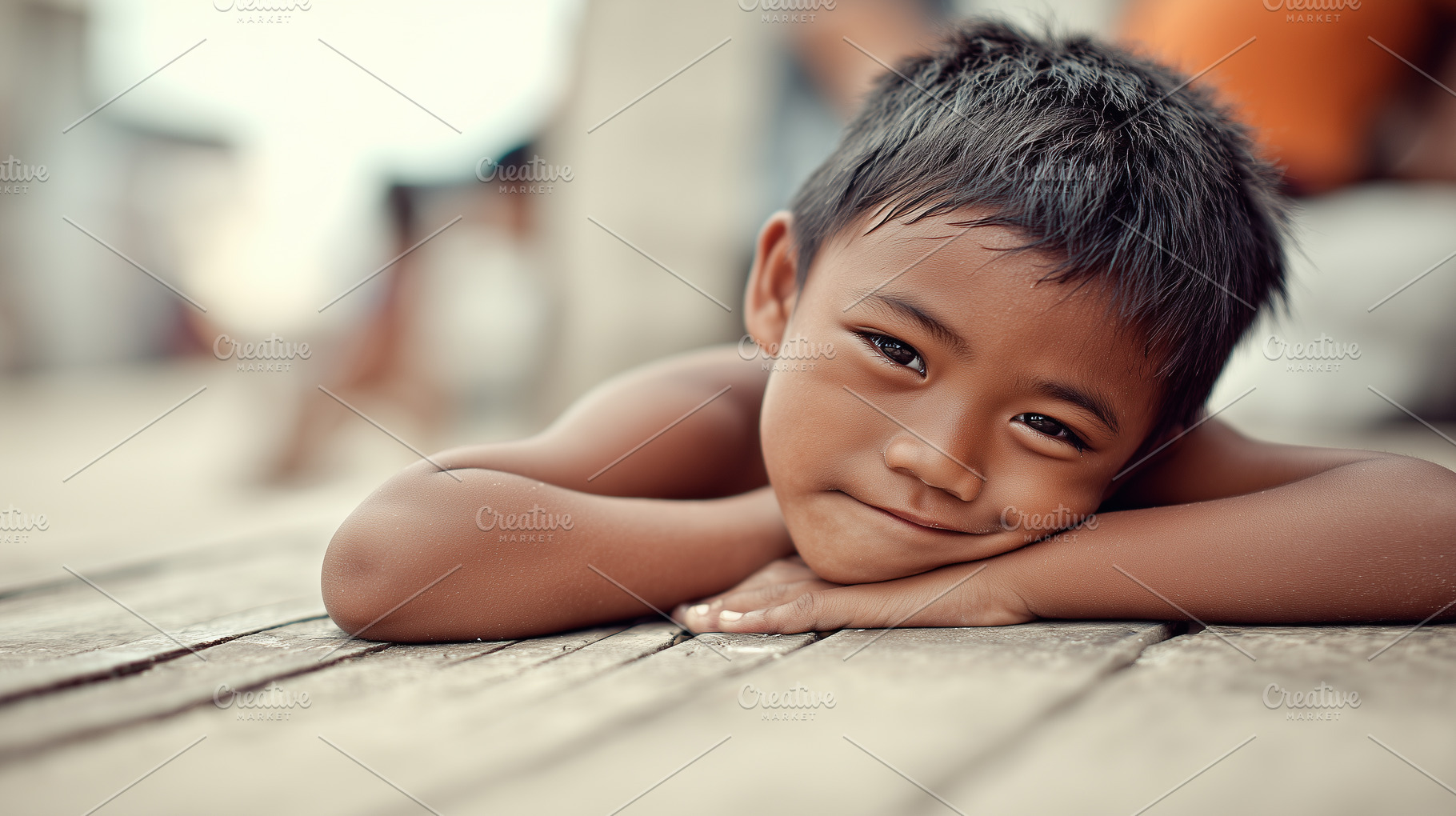 Smiling young boy lying on wooden, a Person Photo by MistyDay