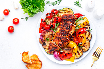 Grilled chicken and various vegetables. Paprika, zucchini, eggpl, a Food & Drink Photo by 5PH