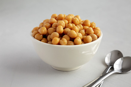 Homemade Preserved Chickpeas in a Bowl, side view. Close-up., a Food & Drink Photo by LiudmylaChuhunova
