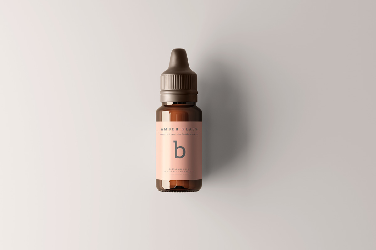 Amber Glass Dropper Bottle Mockups, a Cups & Container Mockup by pmvch (Photo 6 of 20)