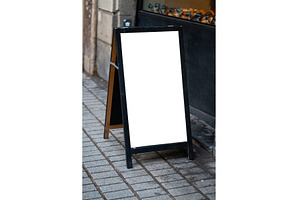 Blank sandwich board sign with white, an Architecture Photo by volodymyrshtun13795