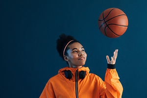 Cheerful female in orange fitness, a Sports & Recreation Photo by Artem Varnitsin