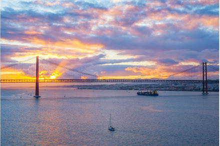 View of 25 de Abril Bridge over, an Architecture Photo by f9photos