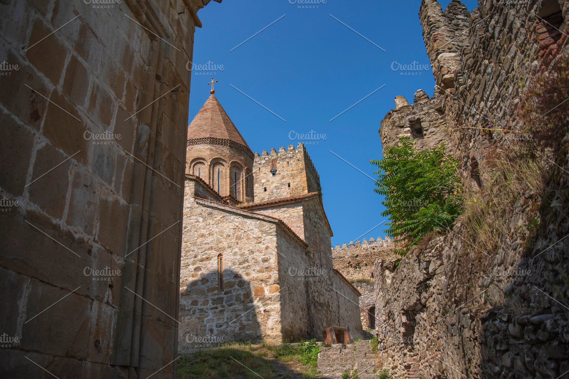 Ancient Ananuri fortress stone church tower under blue sky in Ge, a Photo by Pictures for you!!!!!!!!!
