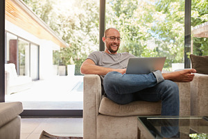Happy mature man having video call, a Person Photo by Jacob Lund