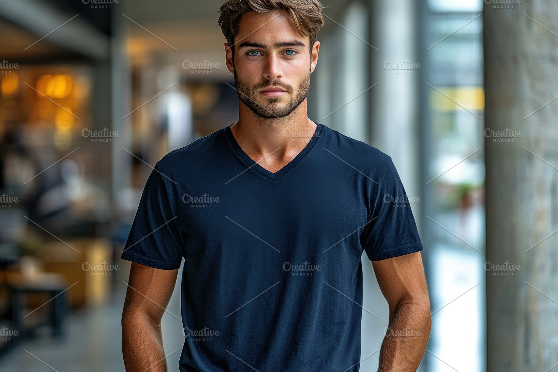 Young man with stylish haircut poses, a Photo by Tanuart