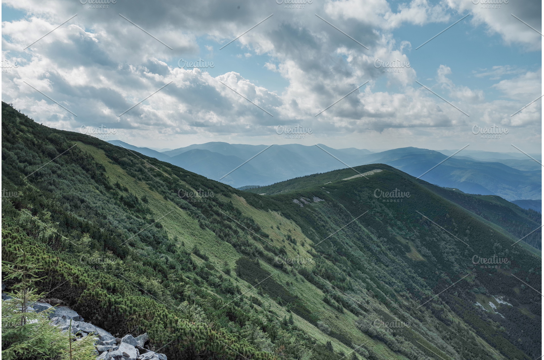 Mountain landscape with hiking trail, a Nature Photo by Stockphoto by vzwer