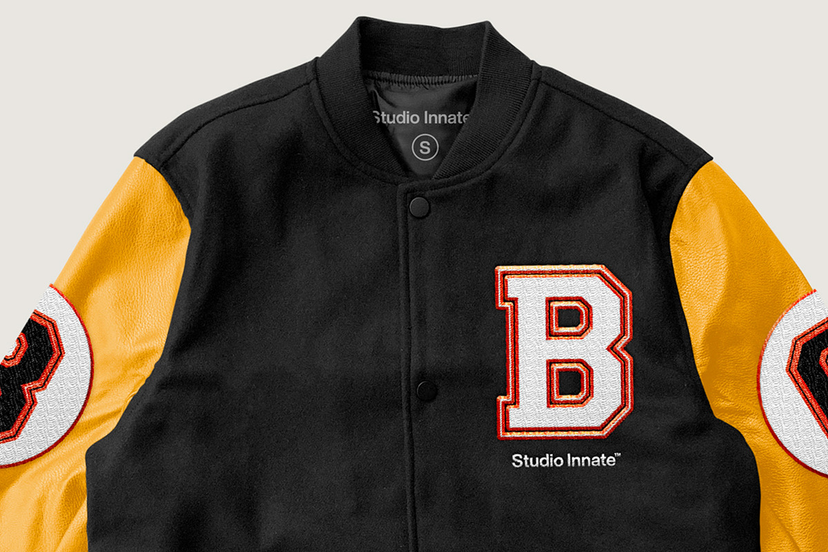 Letterman Jacket Mockup, a Hoody Mockup by Studio Innate (Photo 2 of 4)