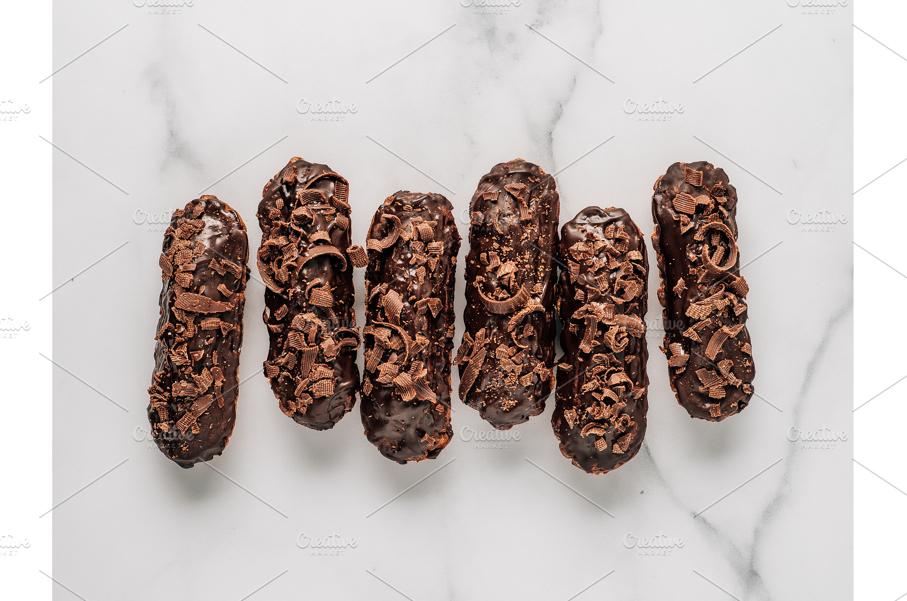 Healthy chocolate eclairs on marble, a Food & Drink Photo by Fascinadora
