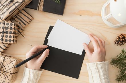 Woman writing a christmas card,JPEG