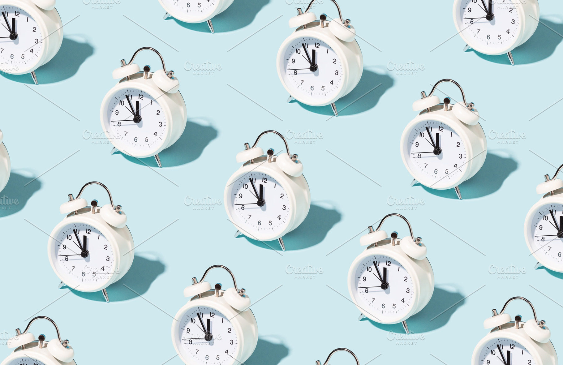 Pattern made of white alarm clocks featuring clock, alarm, and pattern, an Arts & Entertainment Photo by Olga_Z
