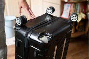 Broken black suitcase with damaged, a Transportation Photo by Our Amazing World
