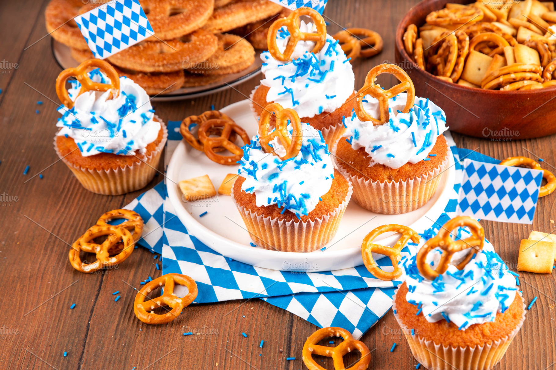 Oktoberfest cupcakes with pretzel and colorful sugar sprinkles, a Food & Drink Photo by Rimma