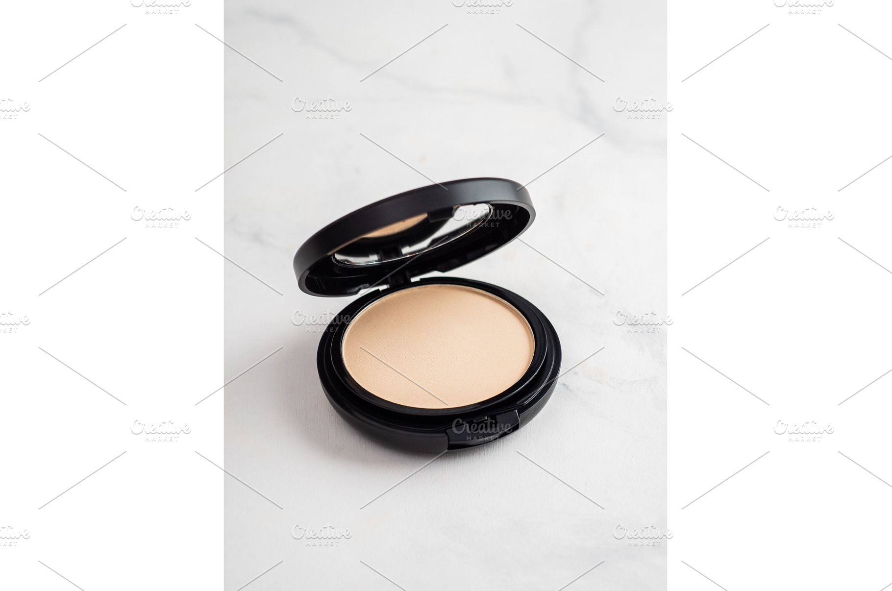 Compact powder on white marble, copy, a Beauty & Fashion Photo by Fascinadora