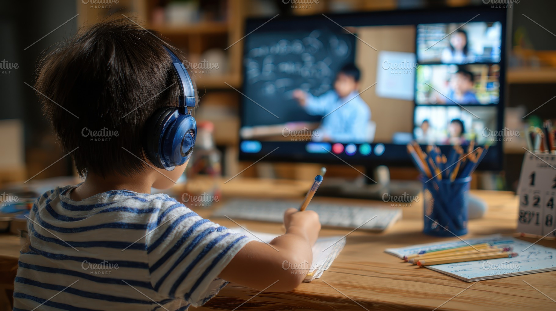 Child attends online class wearing h, a Photo by Pixeness Studio