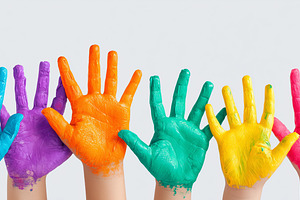 Colorful painted hands raised up, a Person Photo by MistyDay