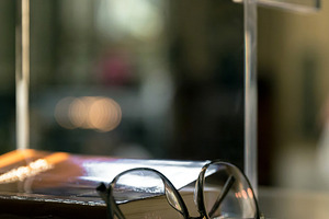 Book and glasses, a School & Education Photo by KYNA STUDIO