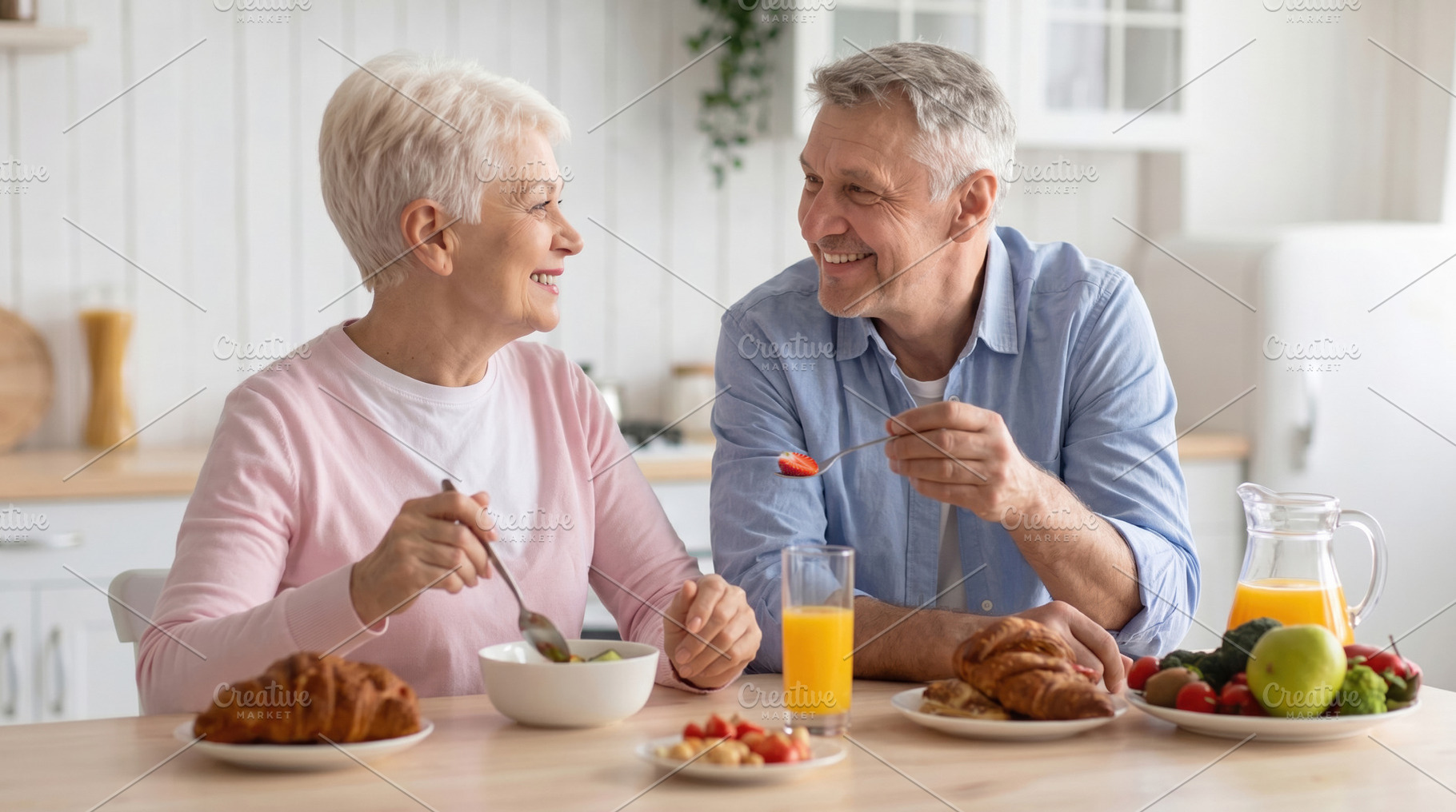 Senior Couple Enjoying Healthy Breakfast Together, a Person Photo by Davizro's Market