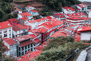 Red rooftops of Cudillero village, an Architecture Photo by SkyNext