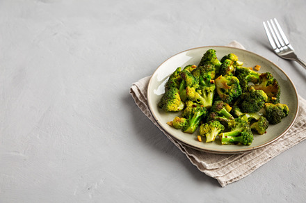 Homemade Pan-Fried Broccoli on a Plate, side view. Copy space., a Food & Drink Photo by LiudmylaChuhunova