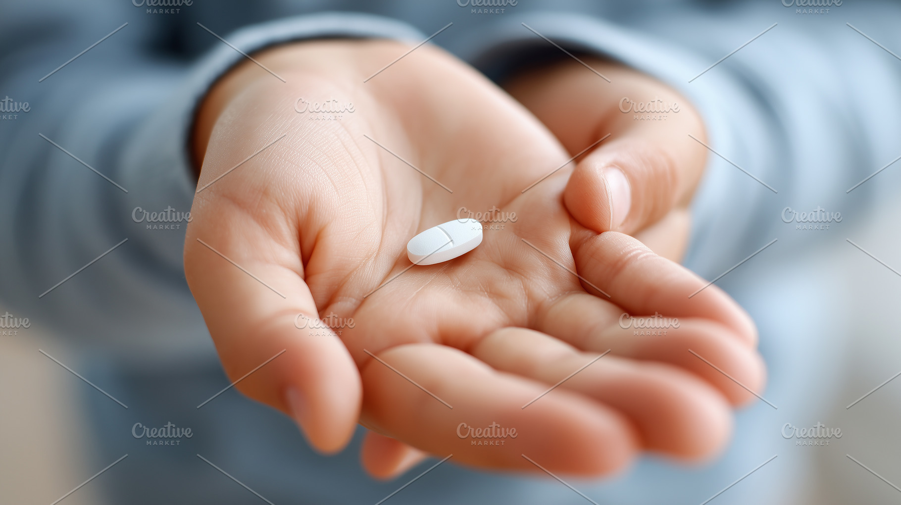 Child's hands holding single pill, a Health & Medical Photo by MistyDay