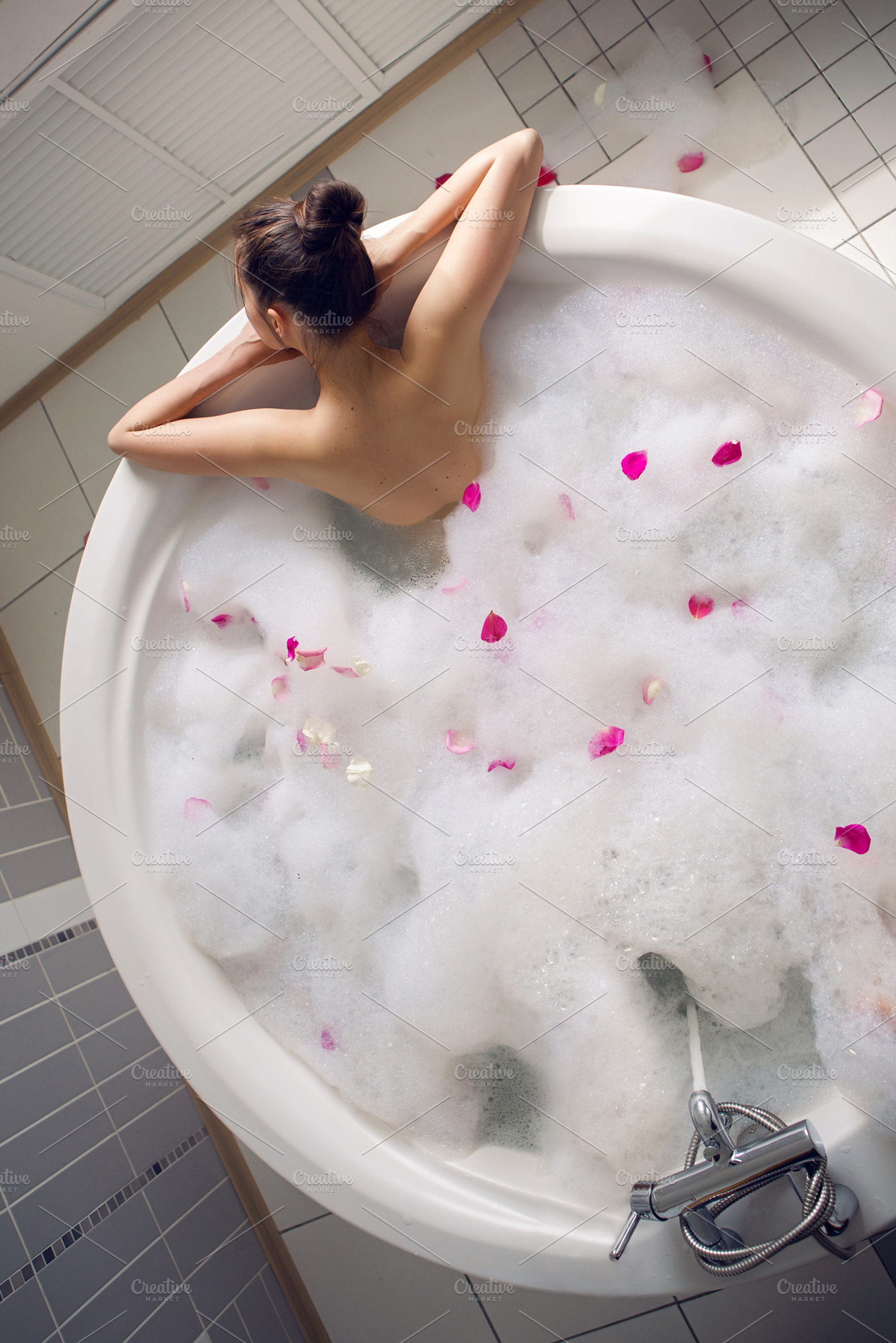Girl lying on belly featuring spa, relax, and hotel, a Health & Medical Photo by SaulichPhoto