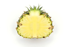 Whole Pineapple With Leaves On White, a Photo by LOGOCREATIVE