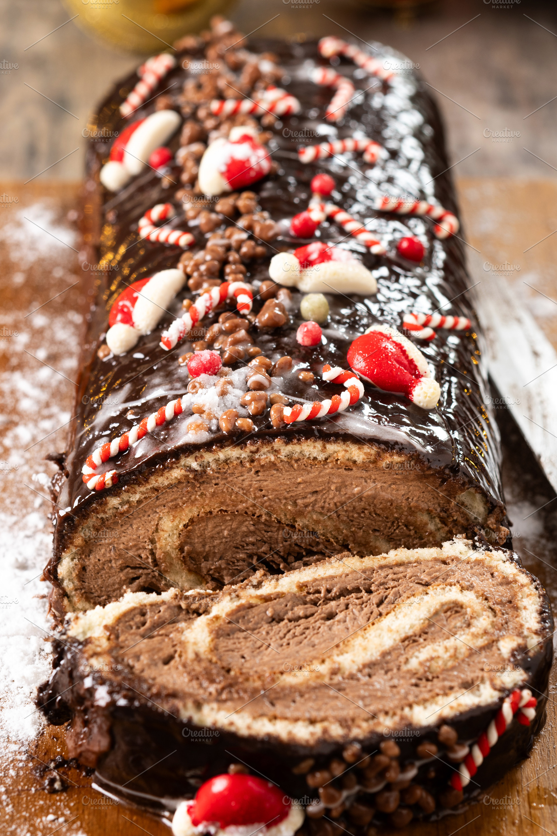 Christmas chocolate yule log cake with festive decorations, a Food & Drink Photo by etorres69