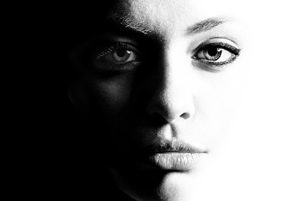 High contrast black and white portrait of a beautiful girl.
