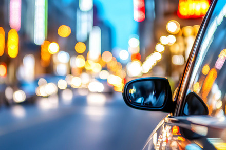 Blurred motion of car with bokeh fro, a Photo by Dvoevnore photos