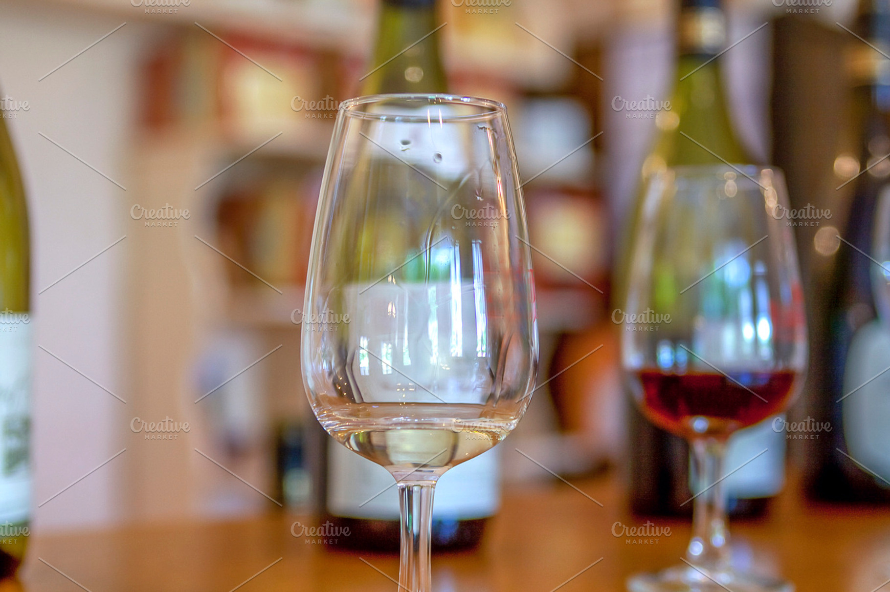 Wine tasting featuring beverage, bottle, and choosing