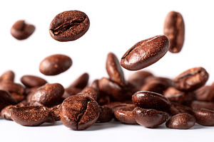 Roasted coffee beans in mid-air as, a Food & Drink Photo by MistyDay